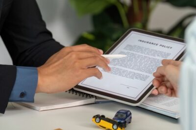 Differences Between First- and Third-Party Insurance Claims A personal injury lawyer explaining first-party vs. third-party insurance claims to a client.